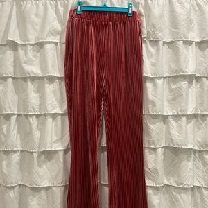 Pink velvet bell bottom pants